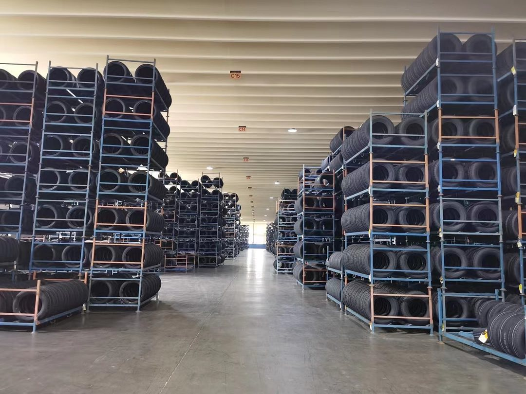 Tire warehouse showing urban road passenger car tire inventory