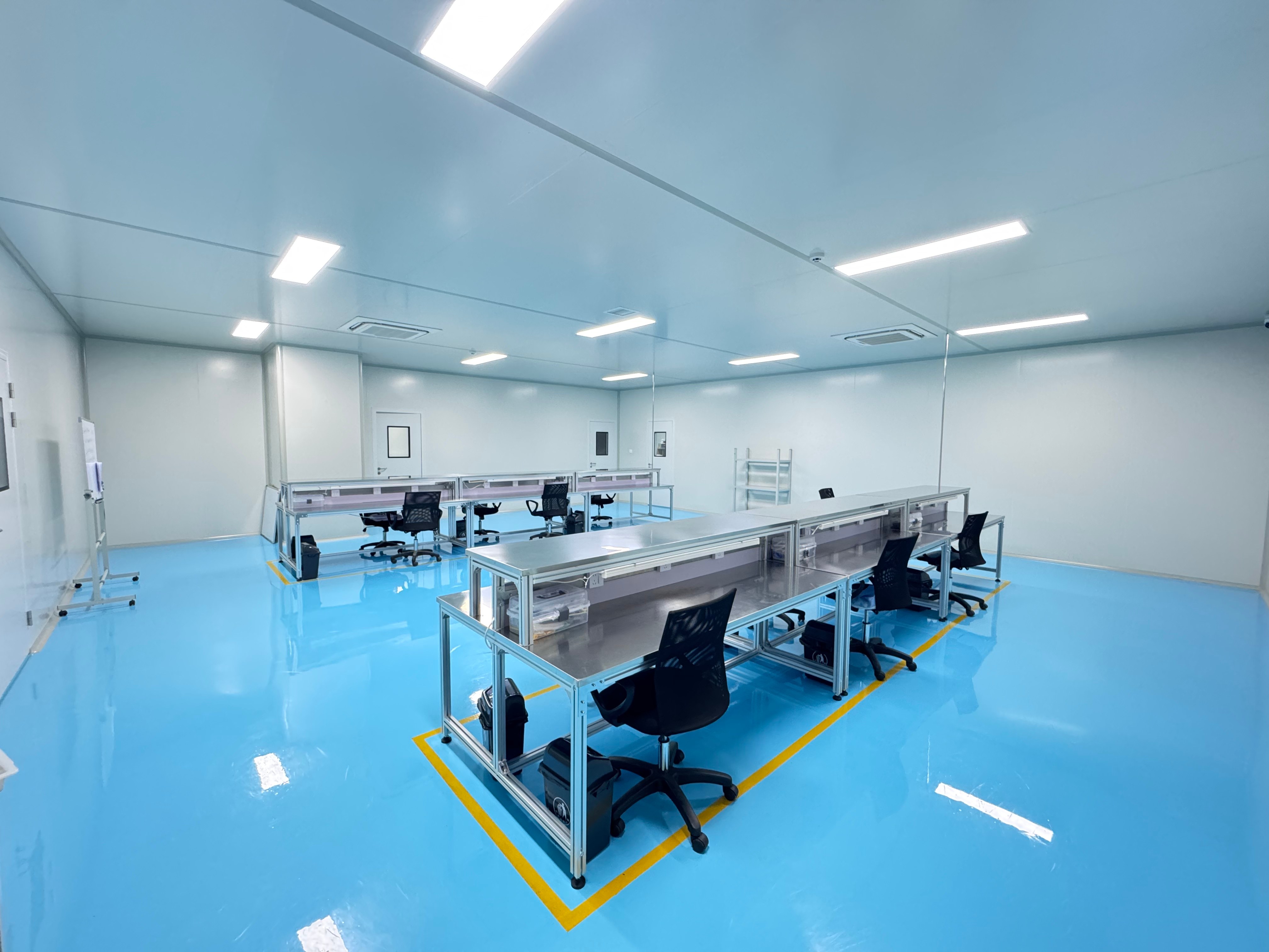 Tattoo cartridge needle manufacturing workshop used for sterile cartridge assembly and production line evaluation