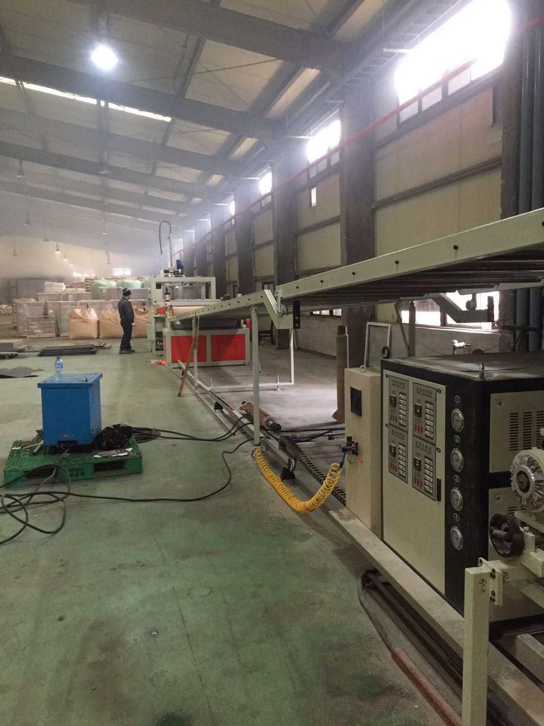 On-site installation of an SPC flooring extrusion line in South Korea