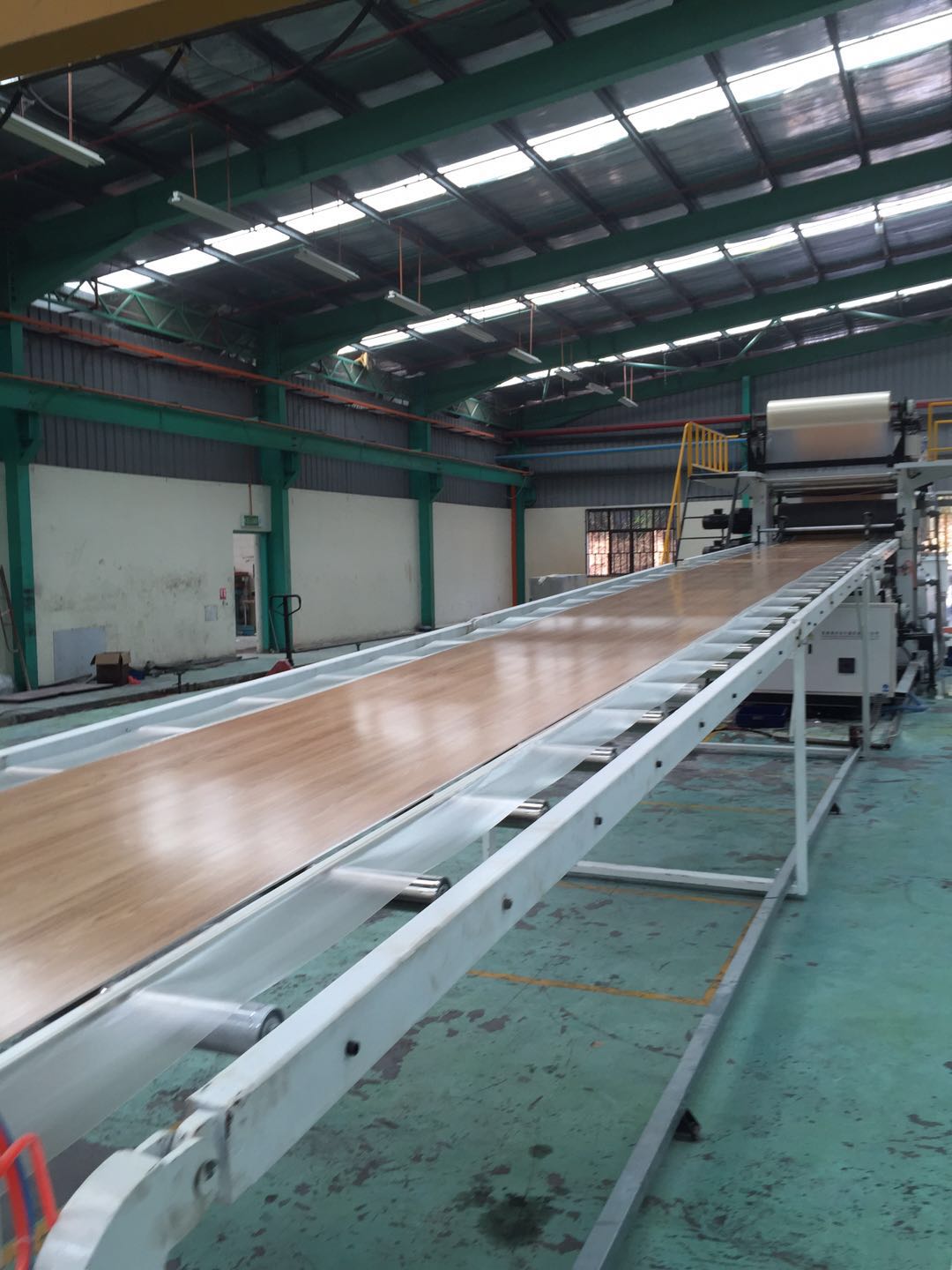 Malaysia SPC flooring production line in operation at customer site