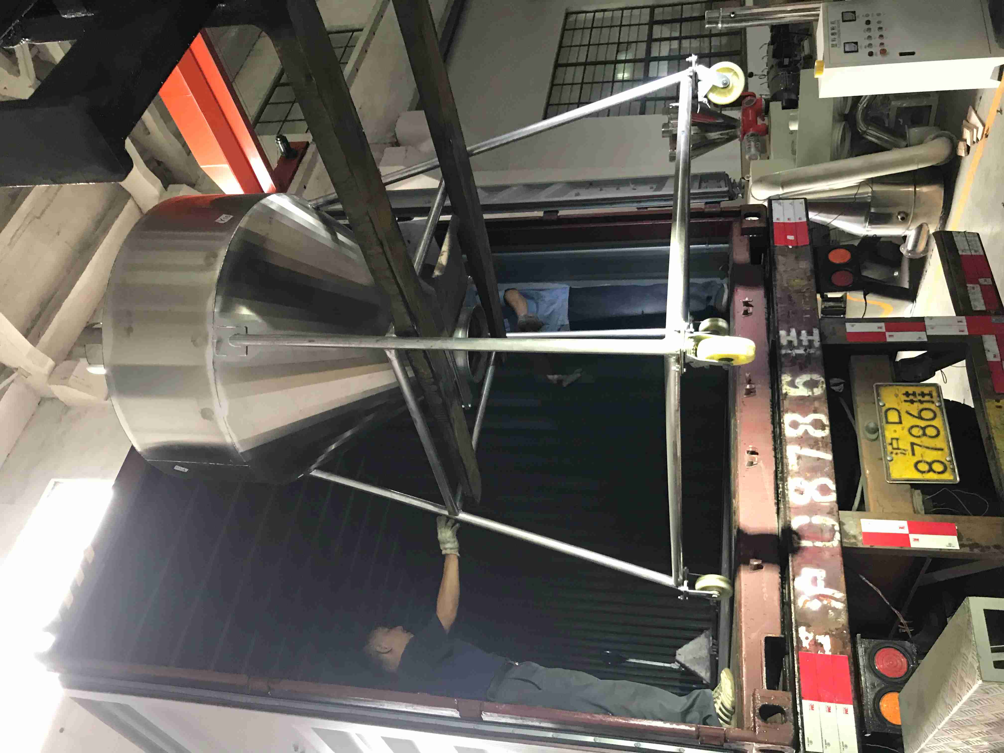 JKS PVC hollow wall panel line auxiliary equipment being loaded for export to Vietnam