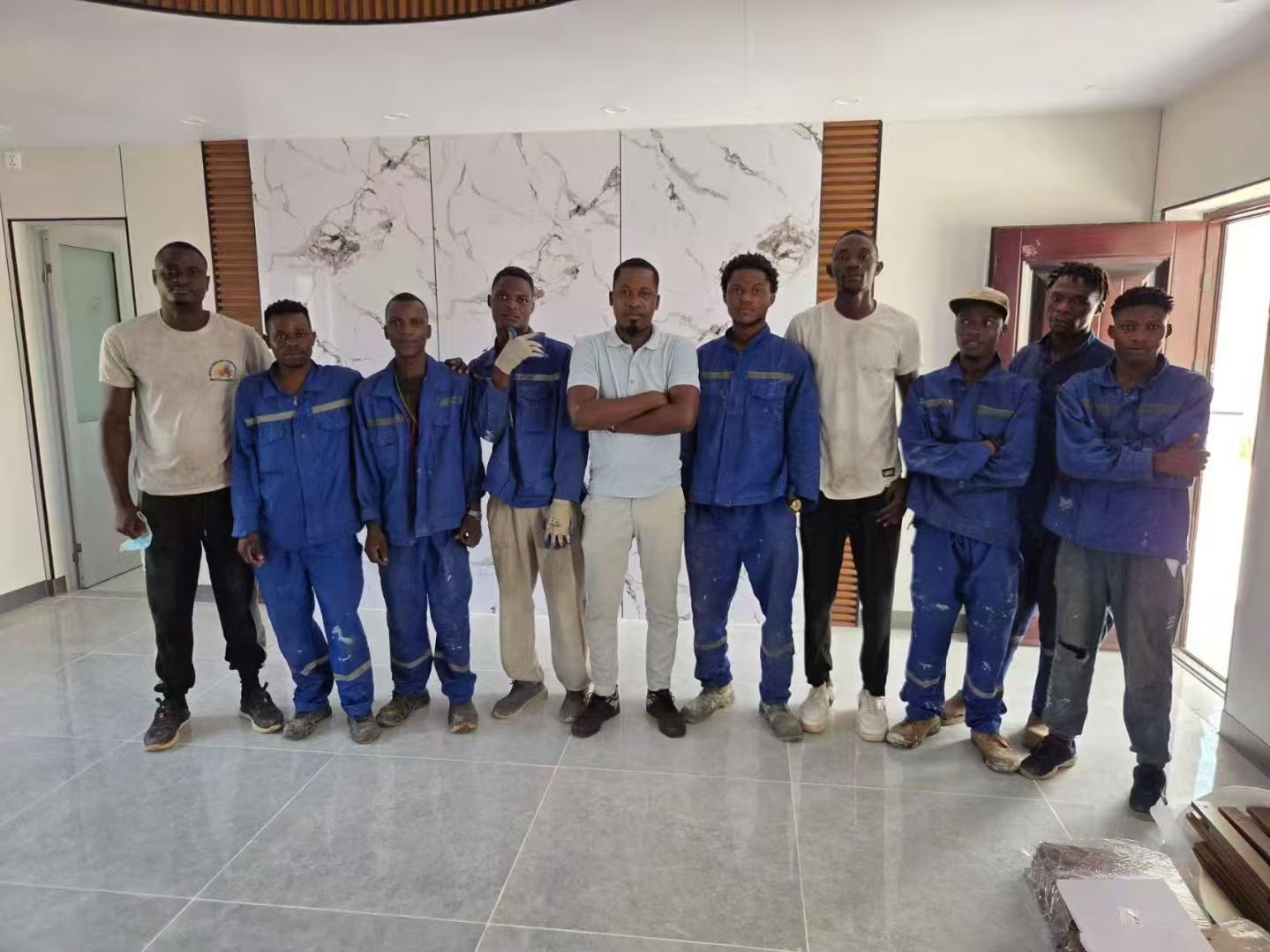 Operators at a panel furniture client factory running SYUTECH woodworking machines