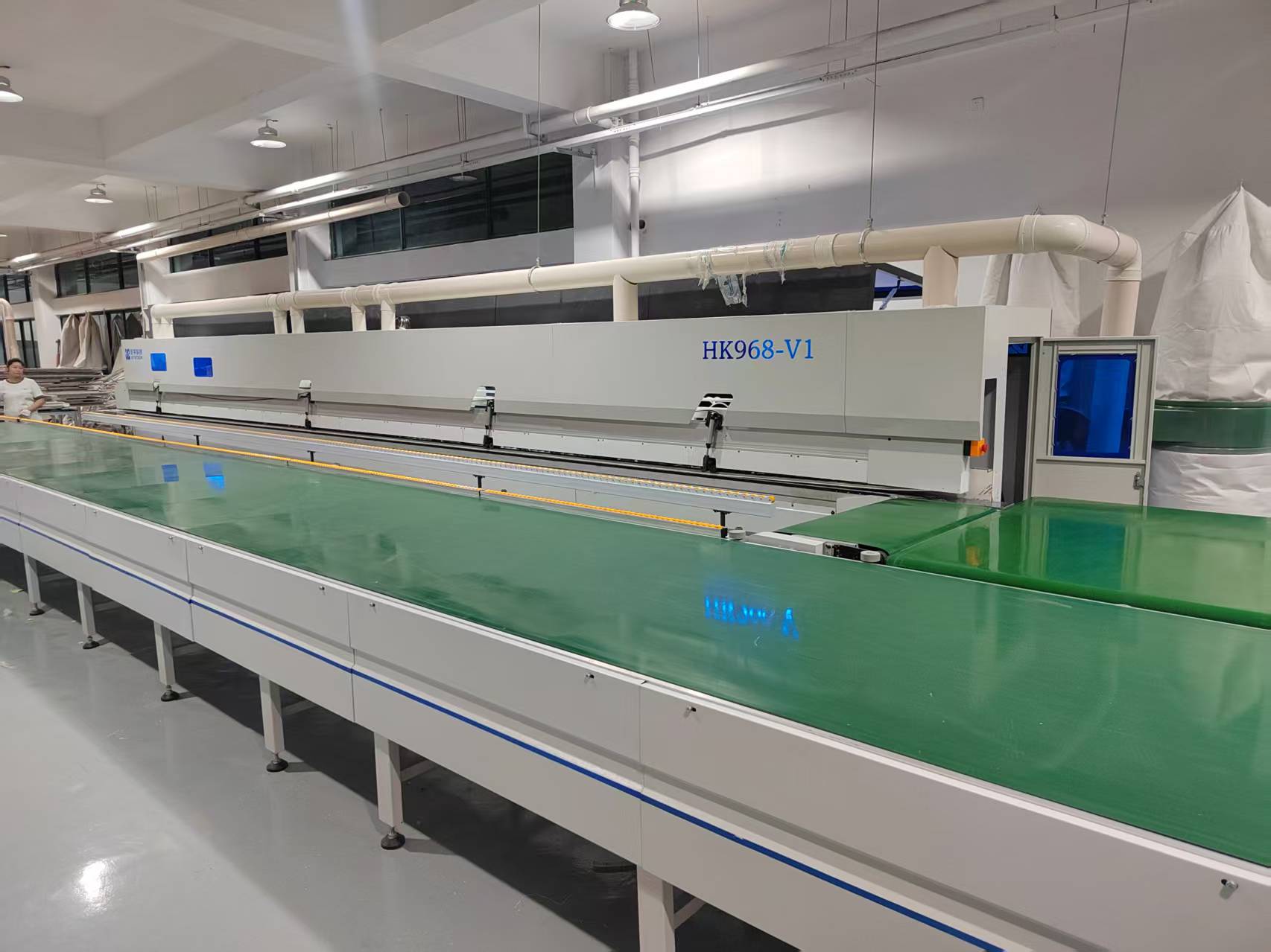 Edge banding machine in operation at client factory