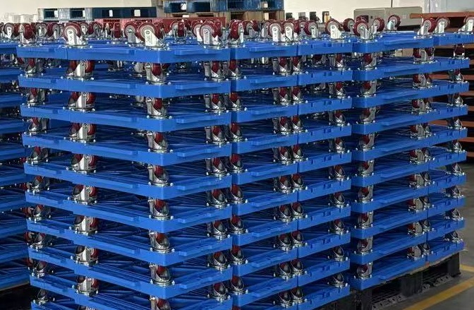 Heavy duty nested and stackable tote dolly TSS-Trolley-02 moving plastic totes in a warehouse
