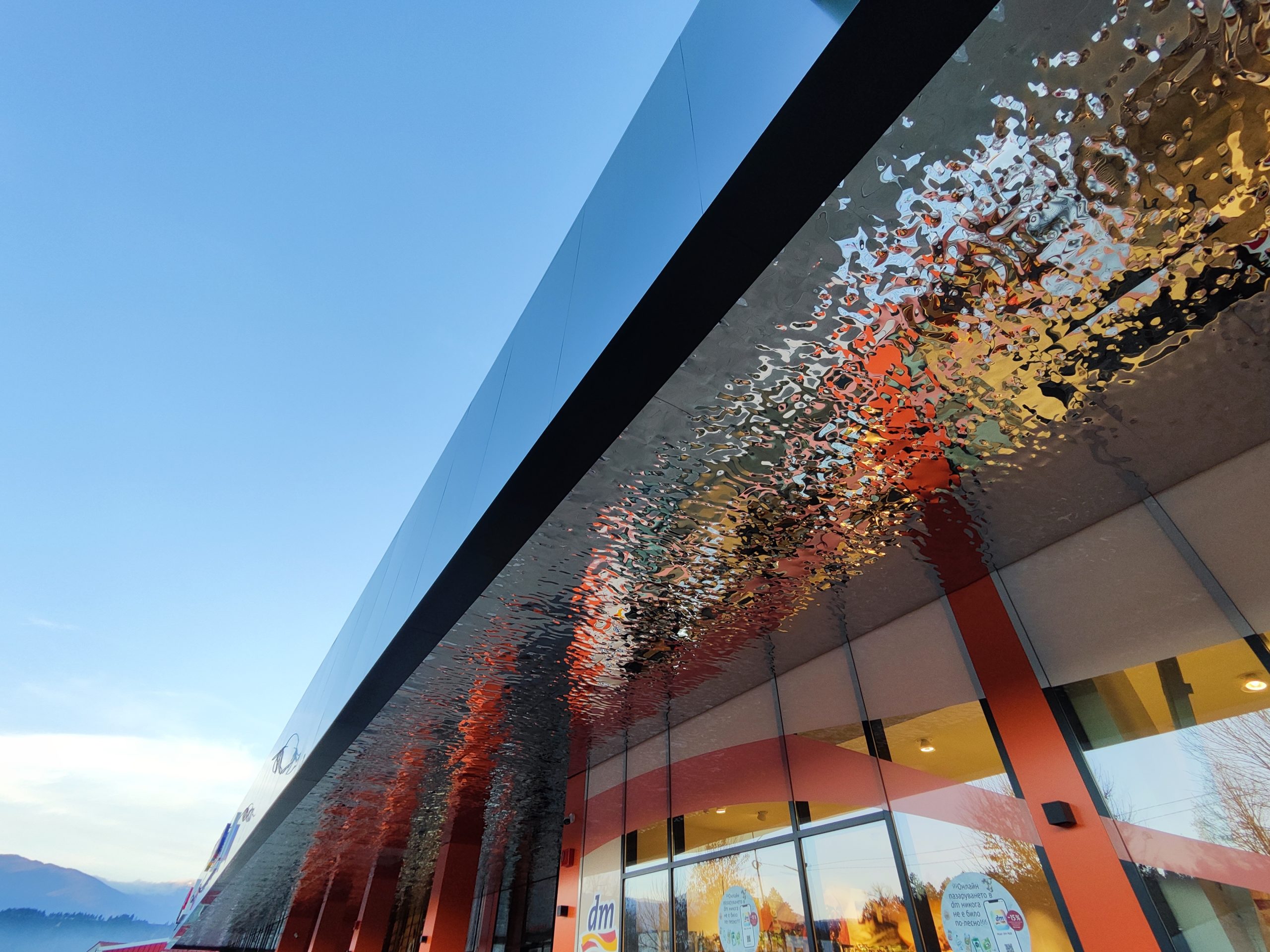 Architectural stainless steel ceiling decoration in a modern hotel or commercial interior