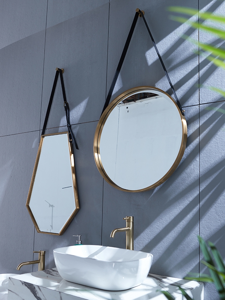 Custom stainless steel mirror frame produced within a custom fabrication scope