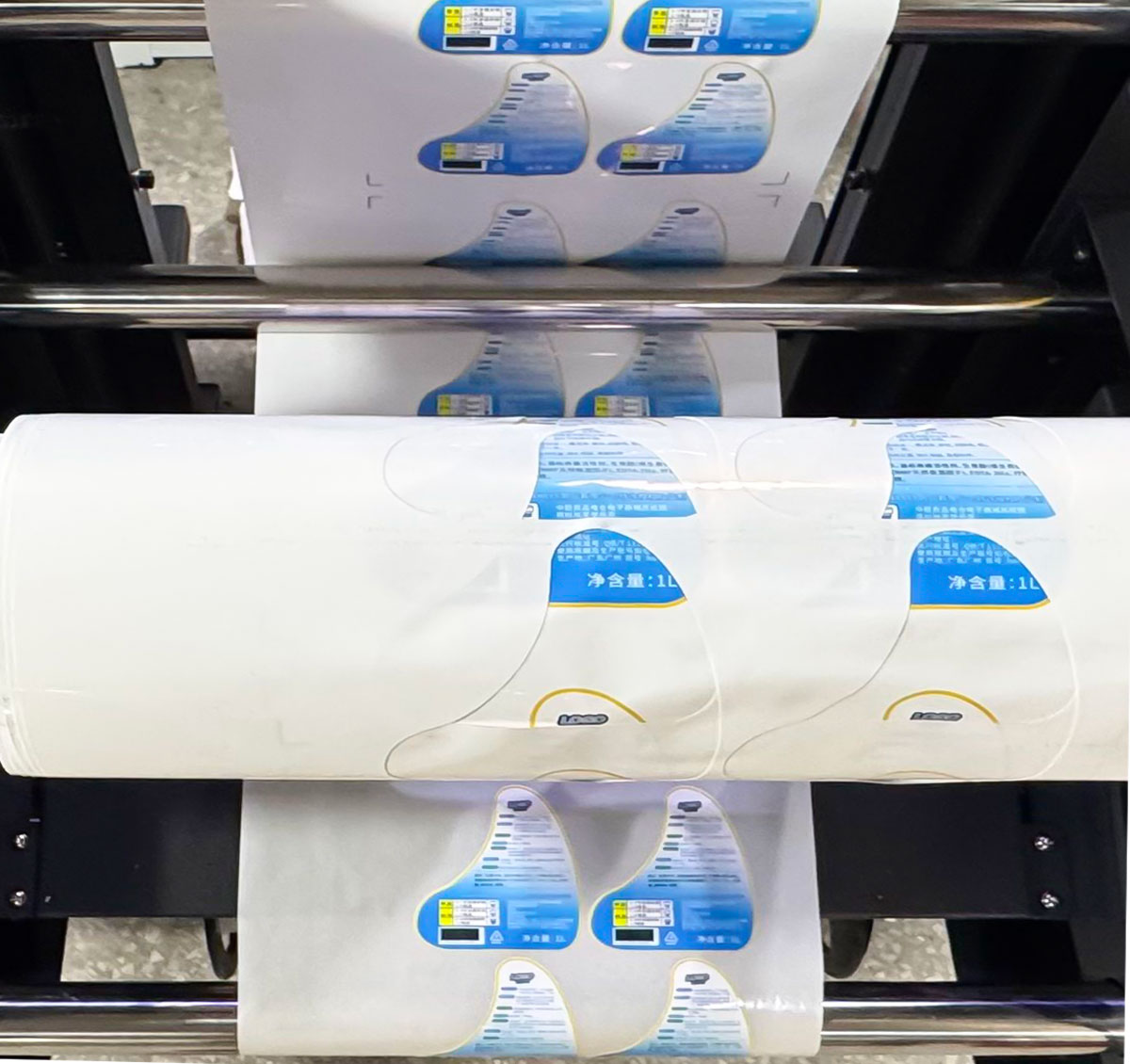 Automatic waste removal and winding design for sticker printing and die-cutting