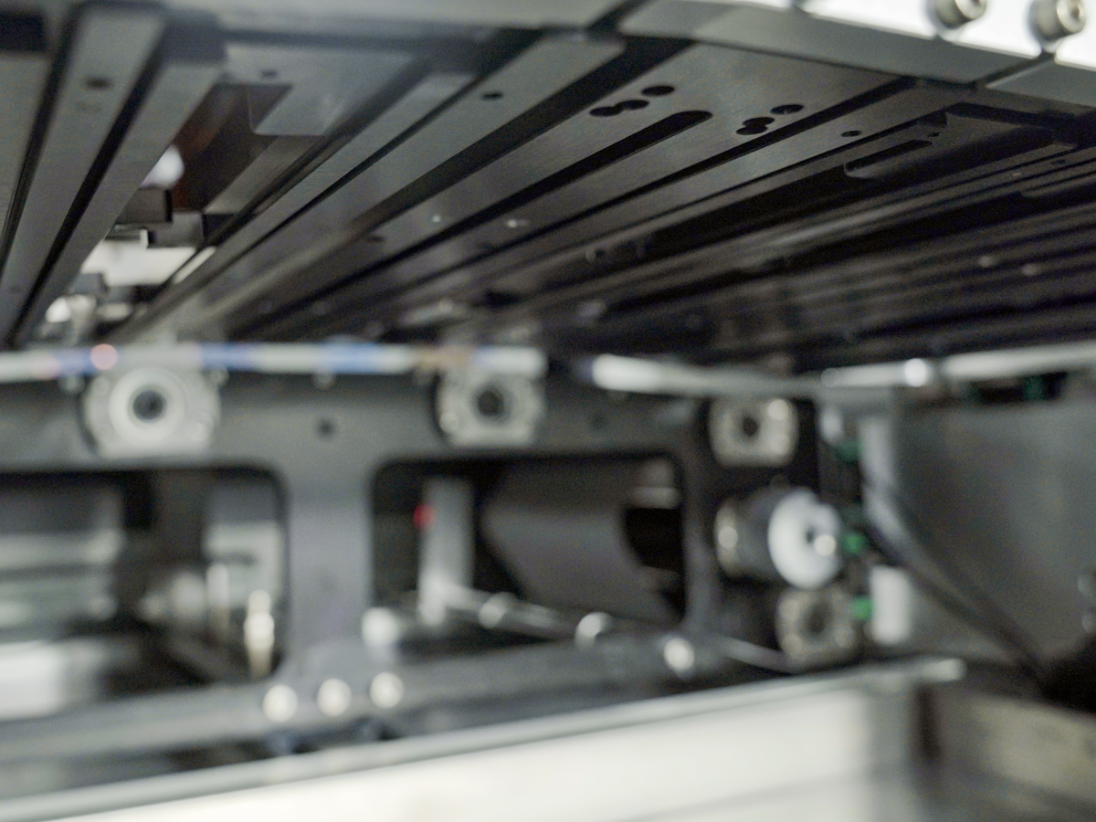 Integrated nozzle maintenance workstation facilitates nozzle cleaning and maintenance.