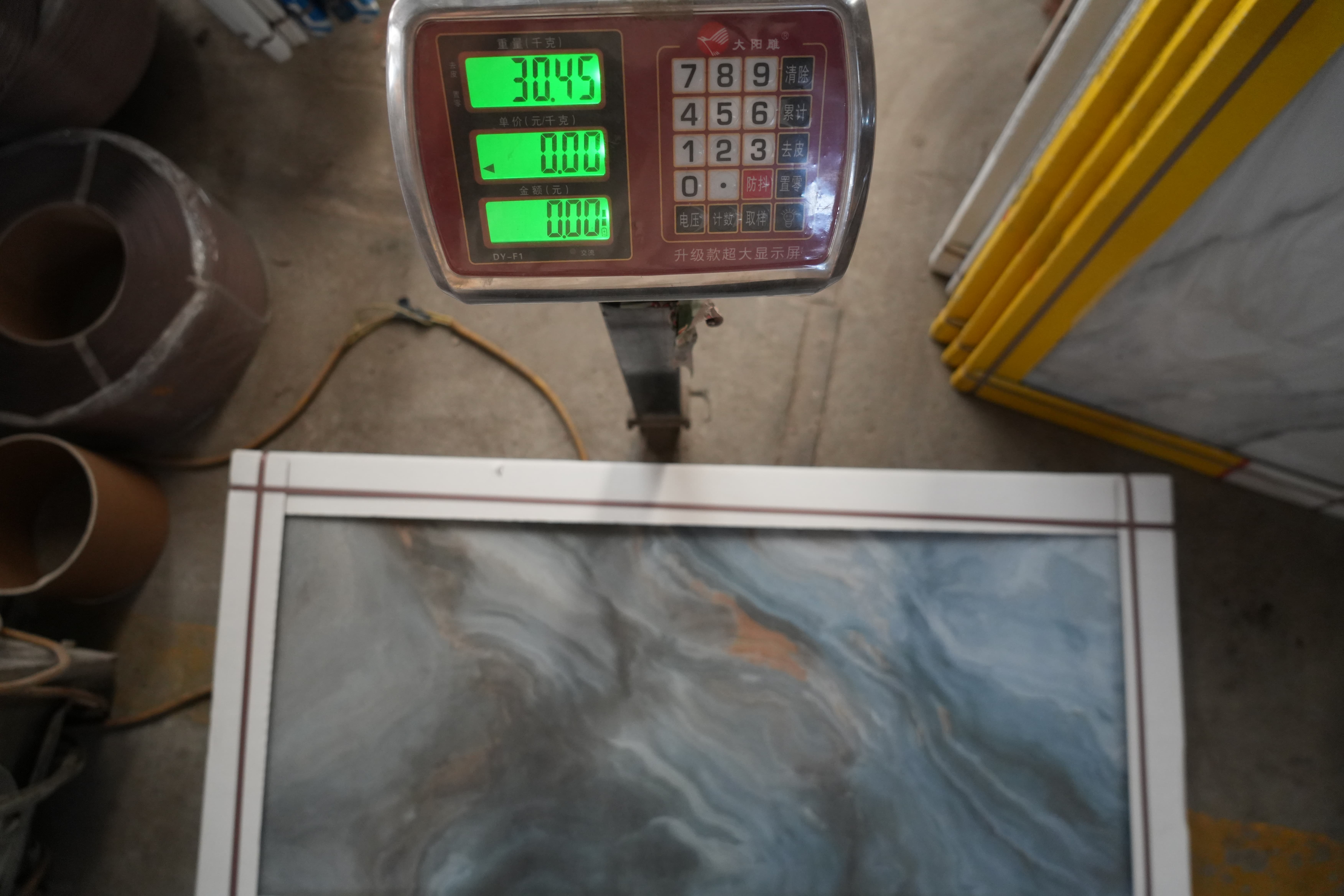 Digital weight monitoring during tile production