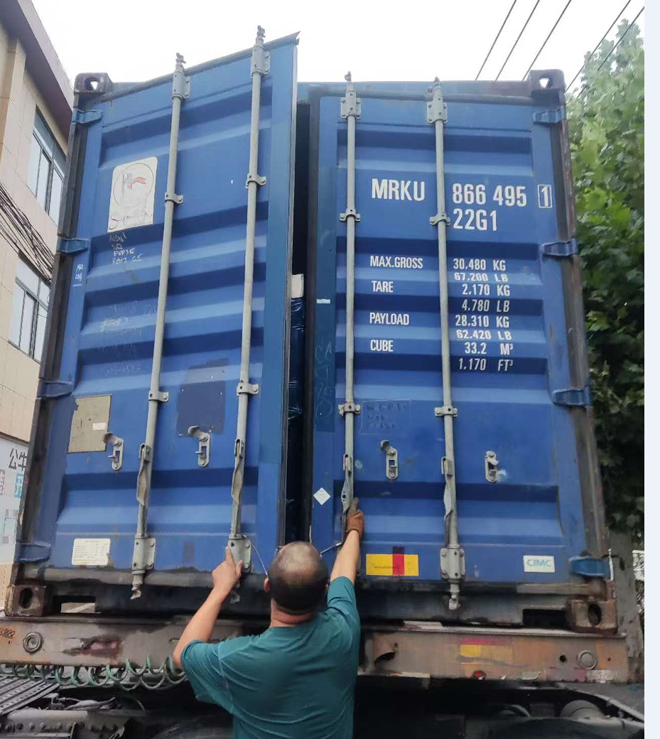Container loading of porcelain tile pallets at the factory
