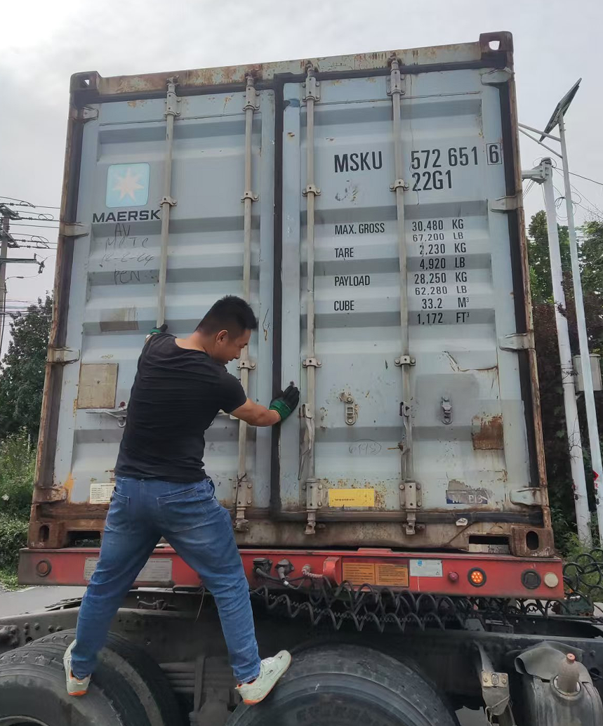On-site container loading for commercial tile export shipment