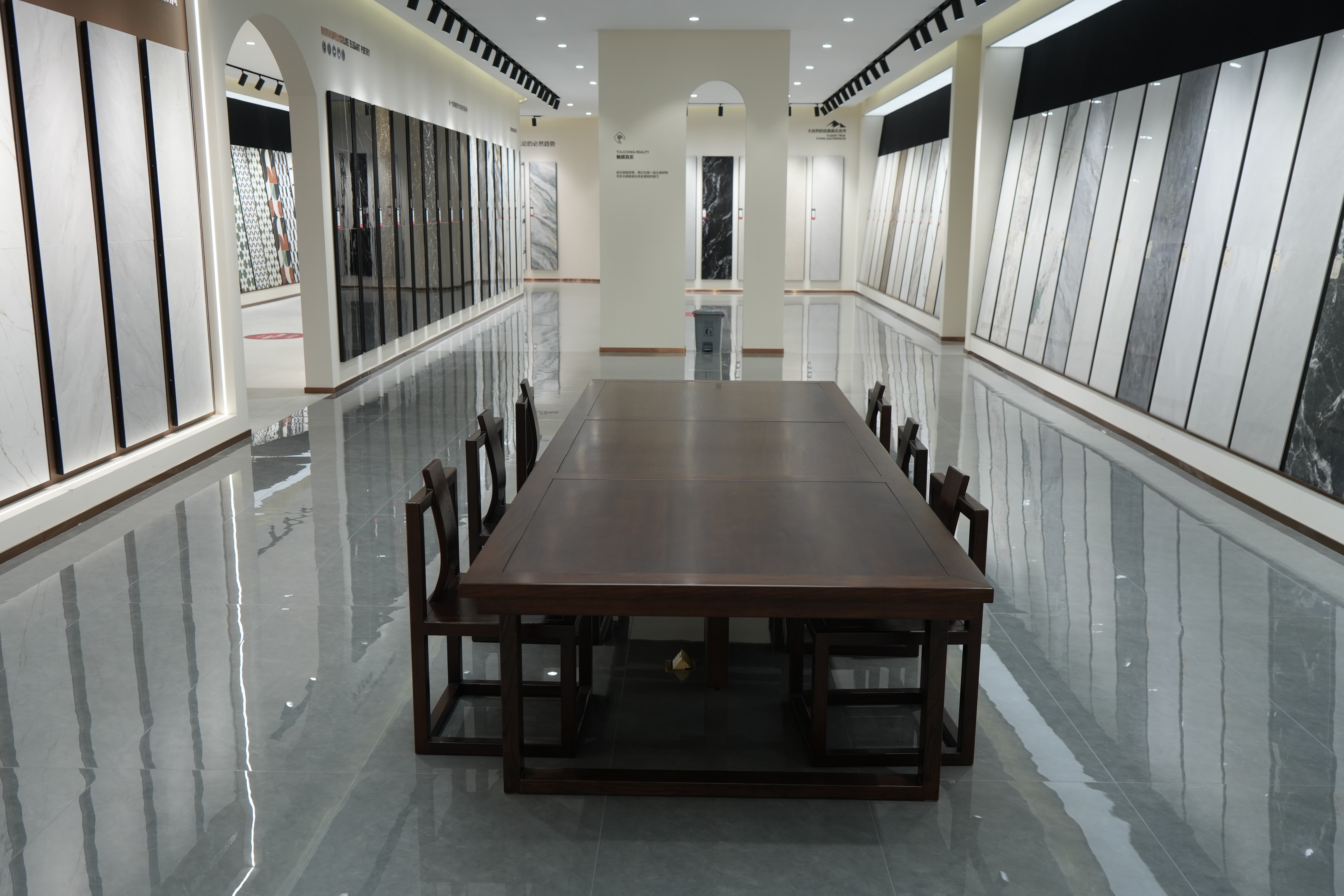 Large-format porcelain tile flooring installed in a commercial interior representative of hotel guest and circulation areas