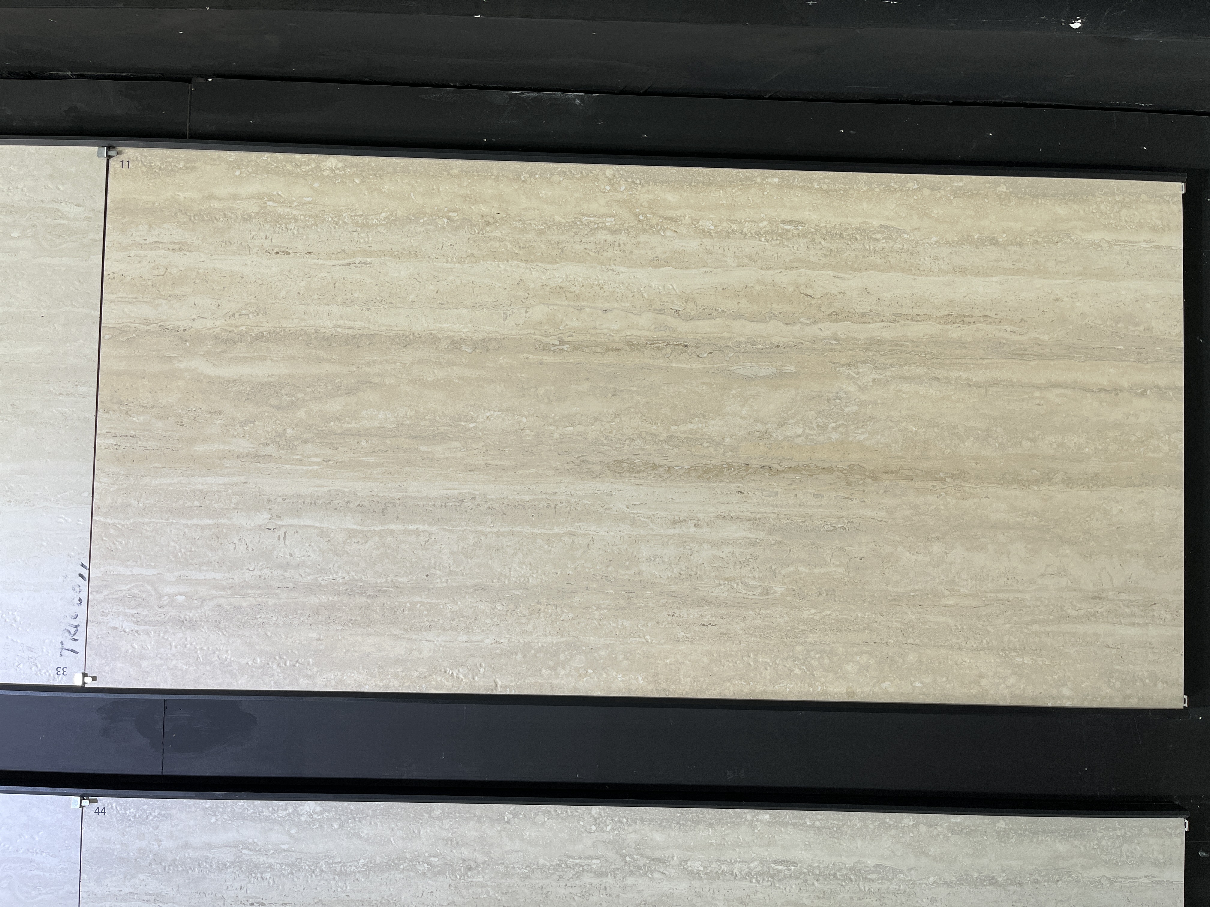 Travertine patterned porcelain tile for flooring