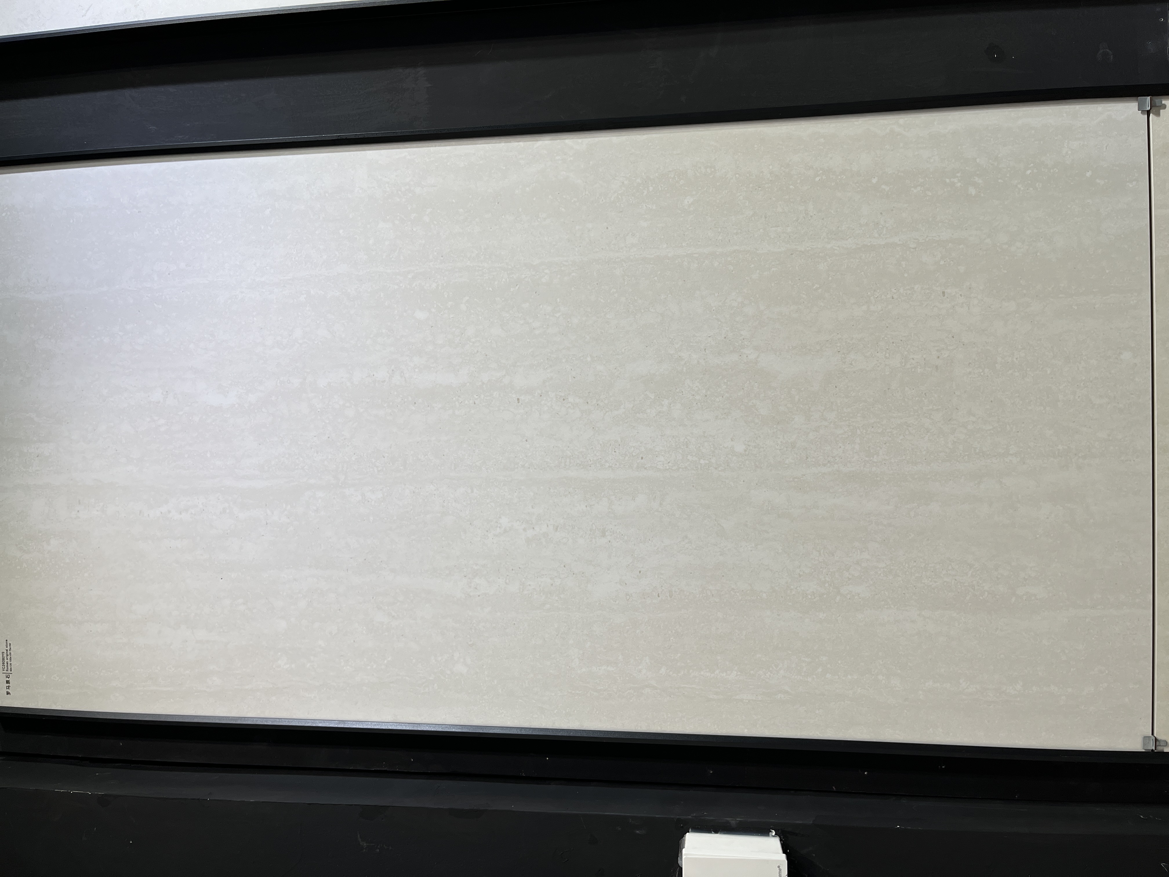 Porcelain tile sample showing surface pattern