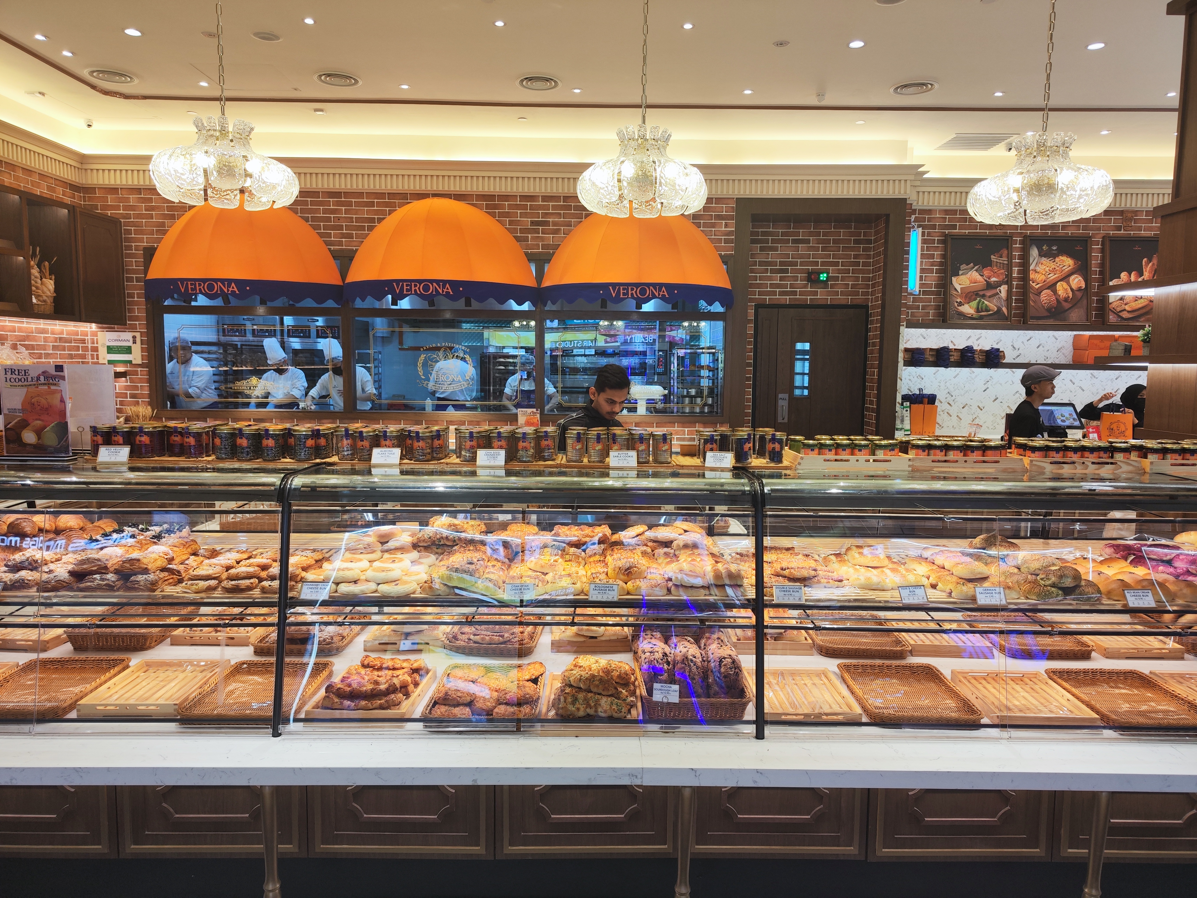 Commercial bakery oven producing pastries in a professional bakery kitchen