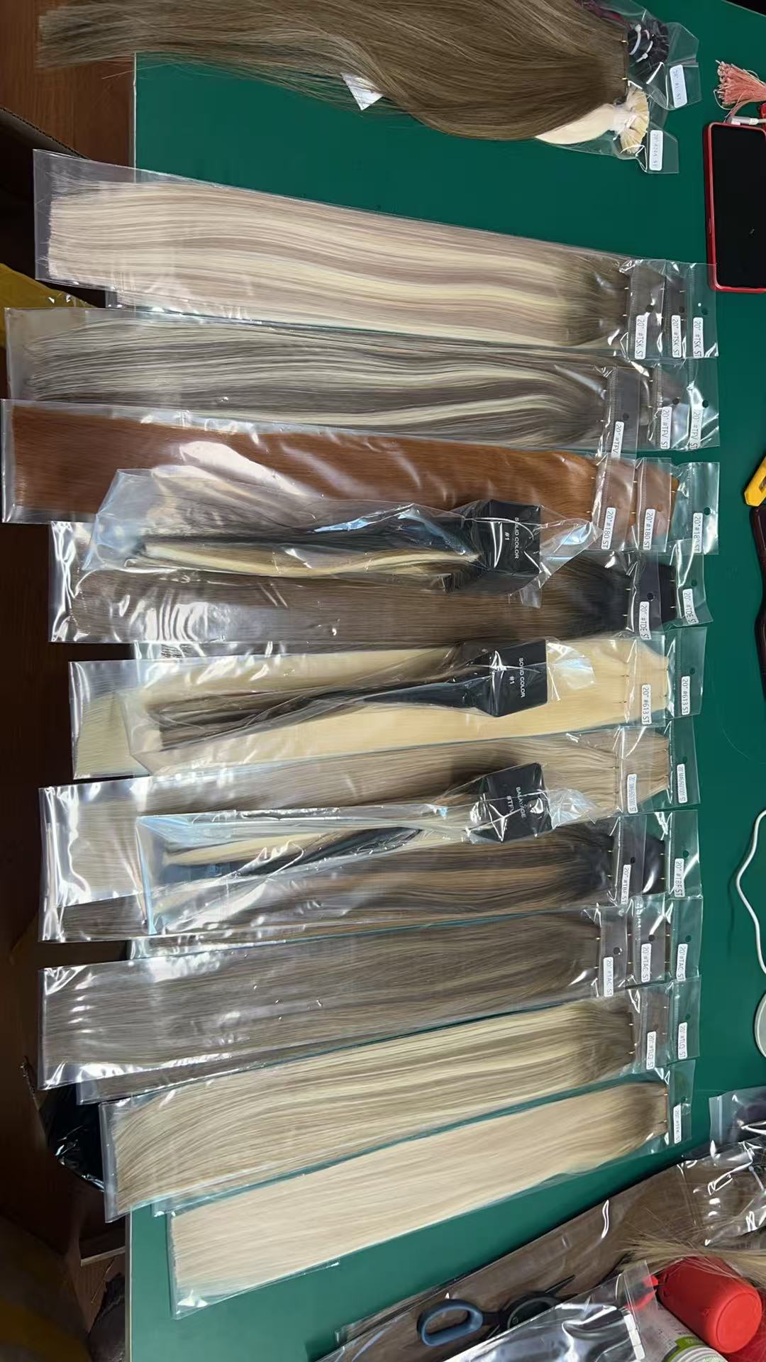 Dolas Dream genius weft hair extension orders packed for shipment to salon buyers