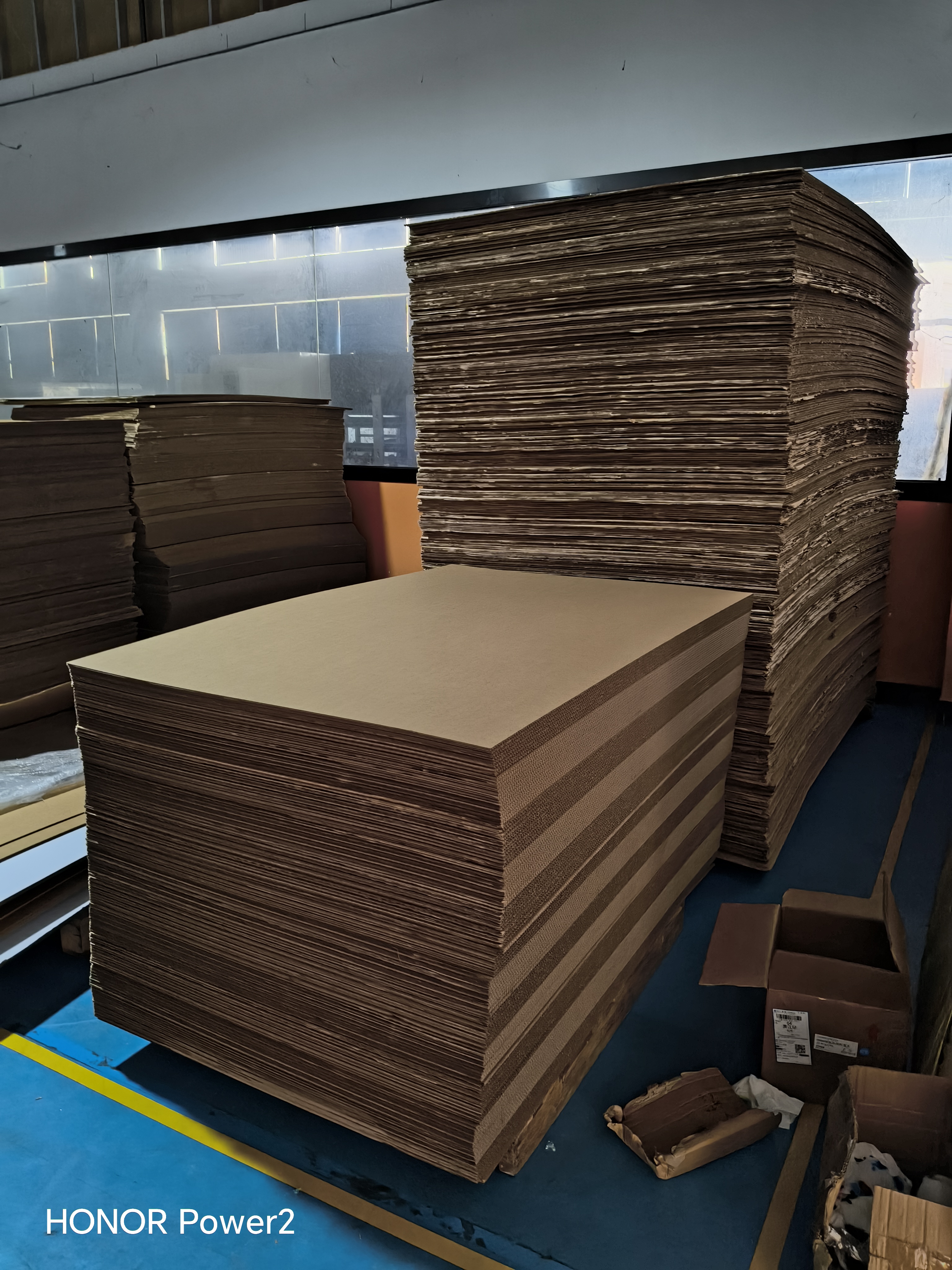 Warehouse stock of corrugated paper ready for digital printing trials