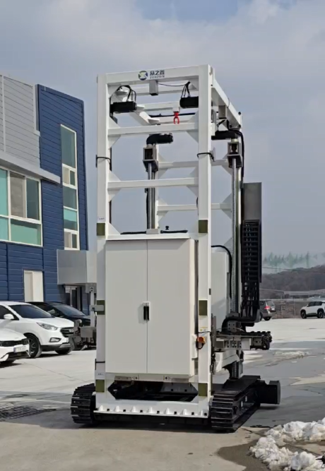 Crawler-driven battery pack insertion robot operating outdoors in South Korea