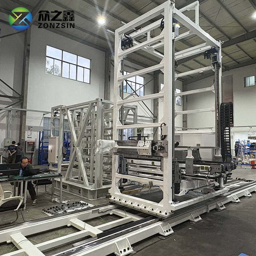 Rail-fixed battery pack insertion robot ZZX2508 in front of an open container