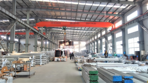 Workshop for packaging irrigation equipment and loading goods into containers.