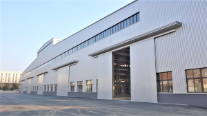 Modern intelligent workshop for irrigation machine spare parts and finished products, ready for shipment.