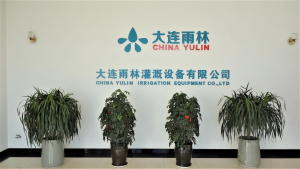 Company reception lobby with China Yulin Irrigation official logo wall, corporate image display area.