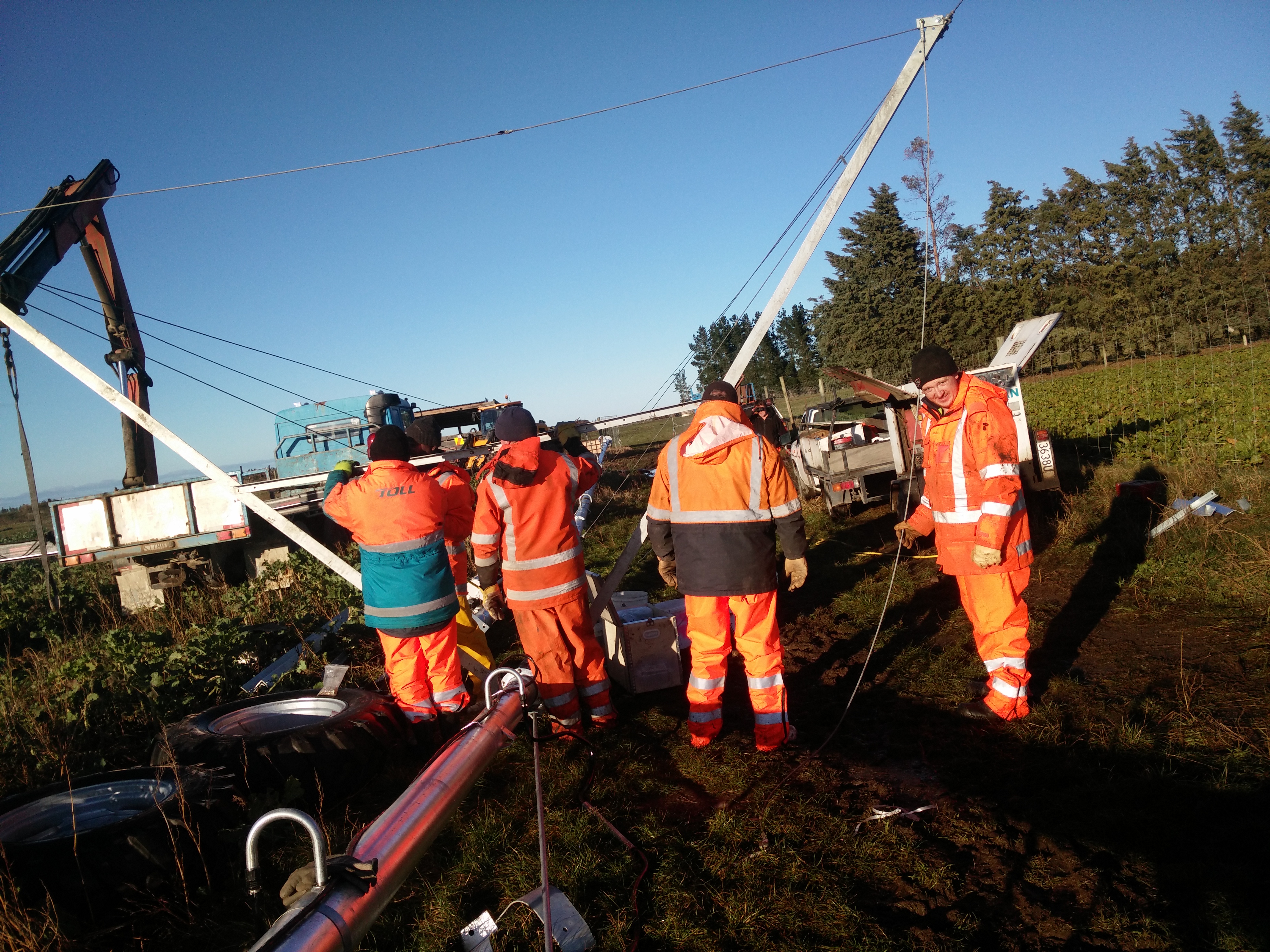 Center pivot irrigation system installation support in New Zealand pasture farm