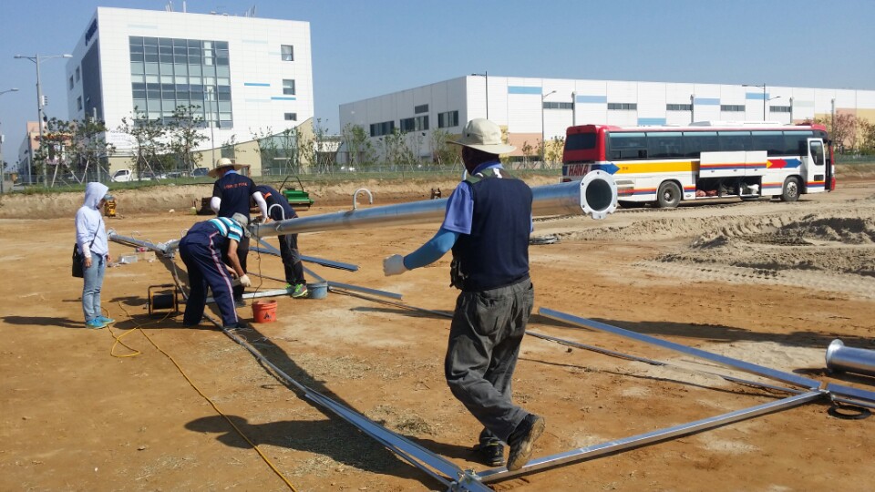 On-site layout and pipeline pre-assembly for a four-wheel linear irrigation machine in South Korea