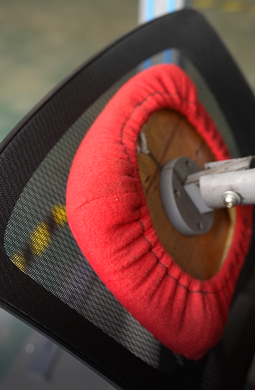 Office chair component testing during production quality control