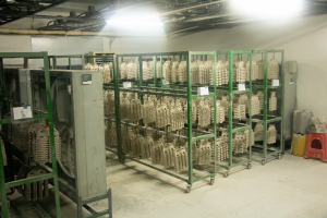 After sandblasting, the silicone film is left to air-dry in preparation for the high-temperature oven.