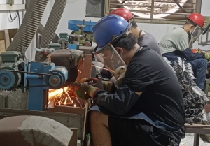 Once the preform has been molded and cooled, it must be cut off.