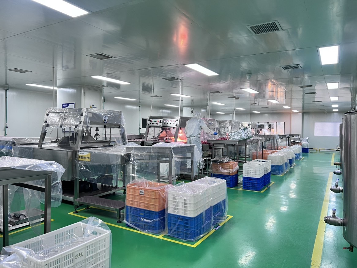 Portioning and coating workshop used in UrSnacks customized strawberry processing