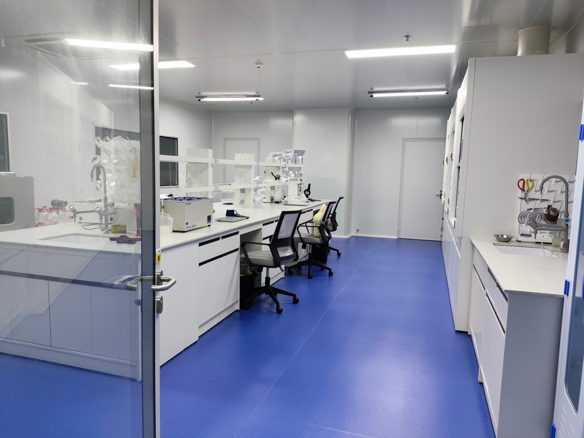 Laboratory performing sensory and physicochemical checks on freeze-dried fruit ingredients