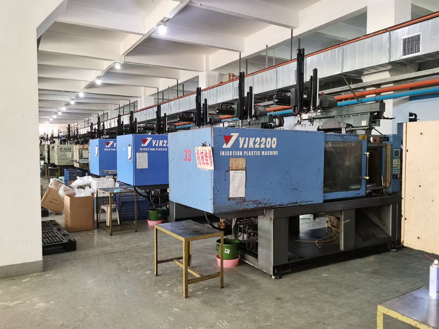 PET preform injection machine in a bottling plant