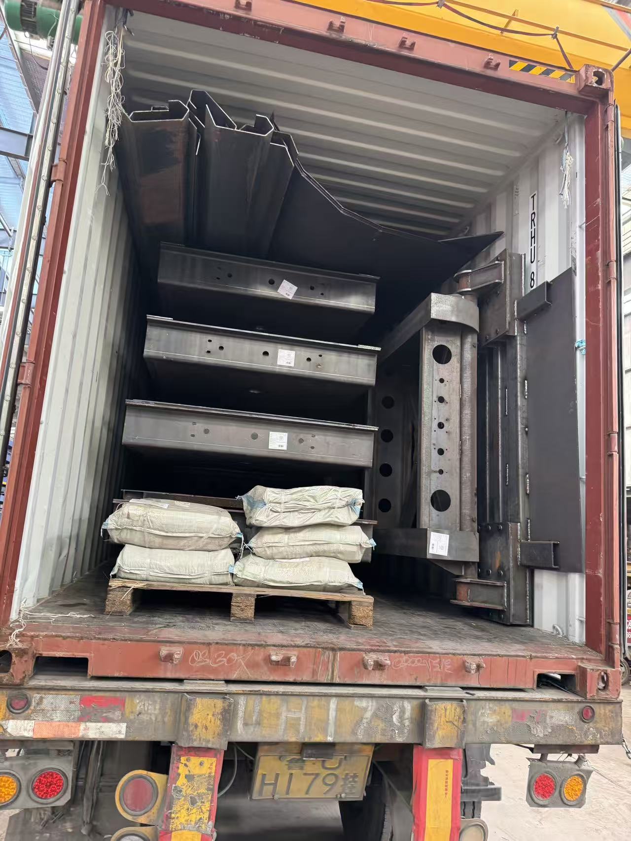 Trailer being prepared for export shipment with documented packaging and delivery process