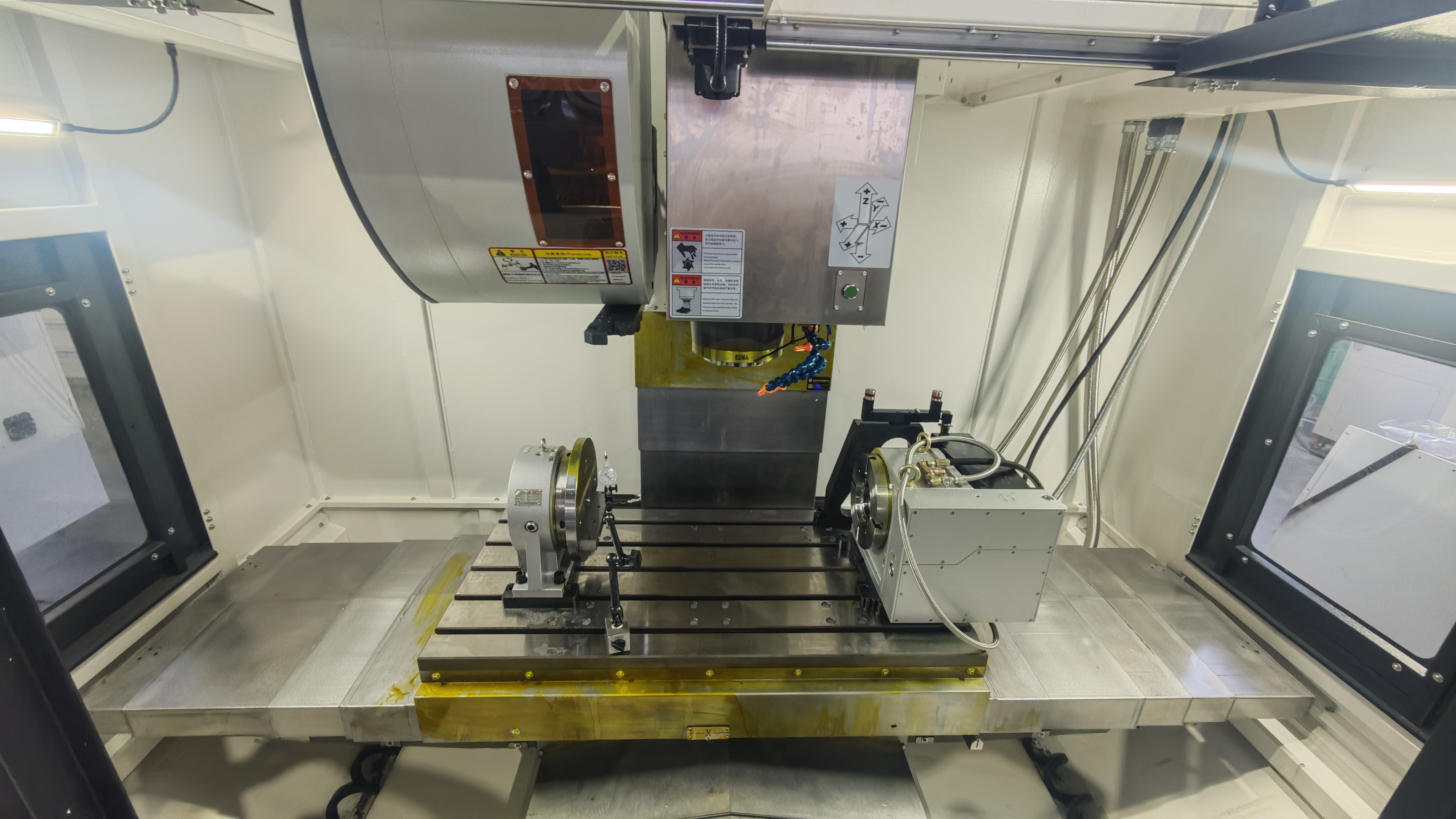 Geometric accuracy inspection of a CNC machining center axis system