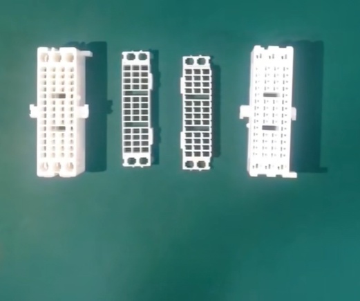 Automotive plastic injection molded parts assembly