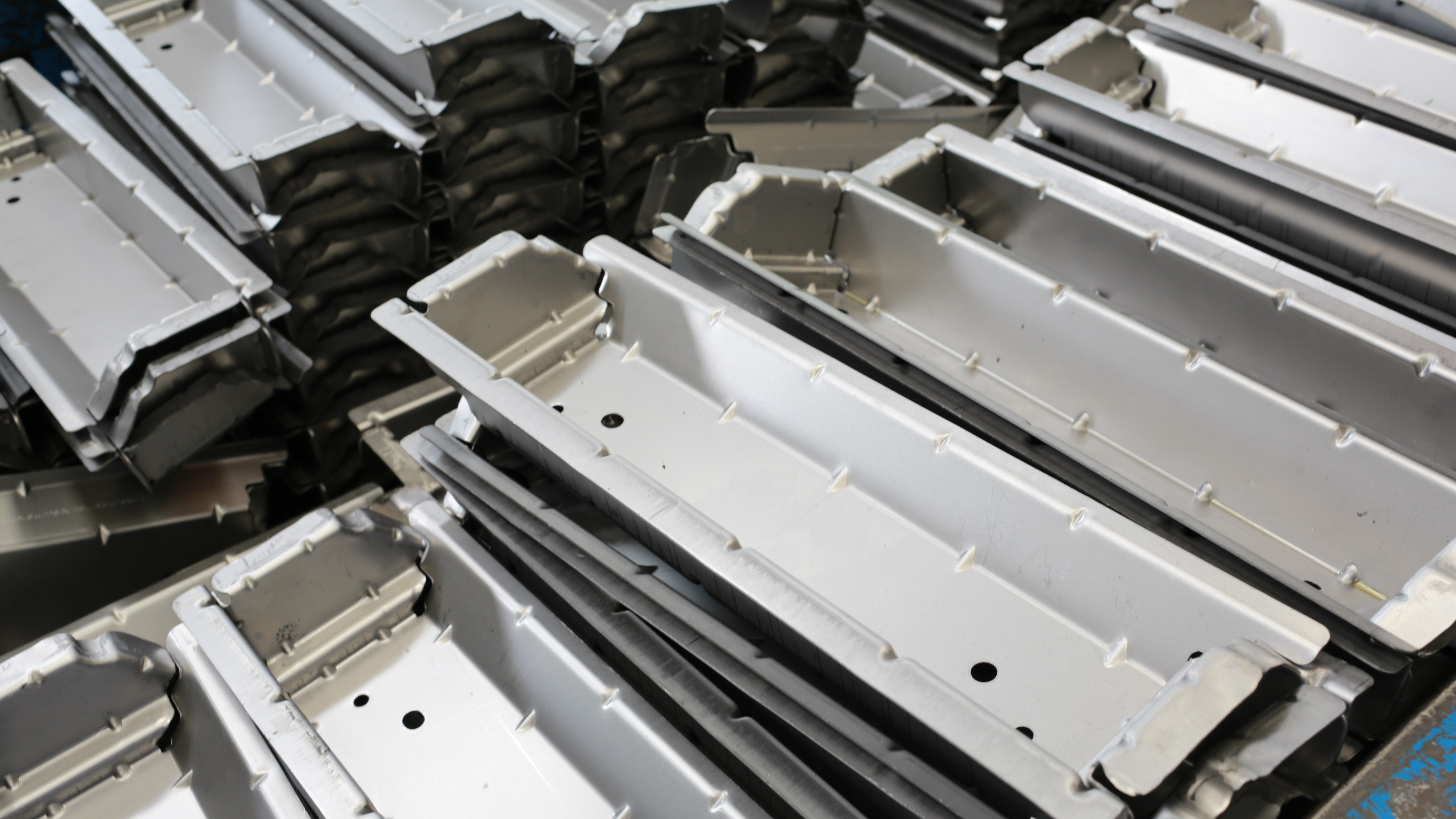 Stamped metal parts produced from cold rolled steel and stainless steel