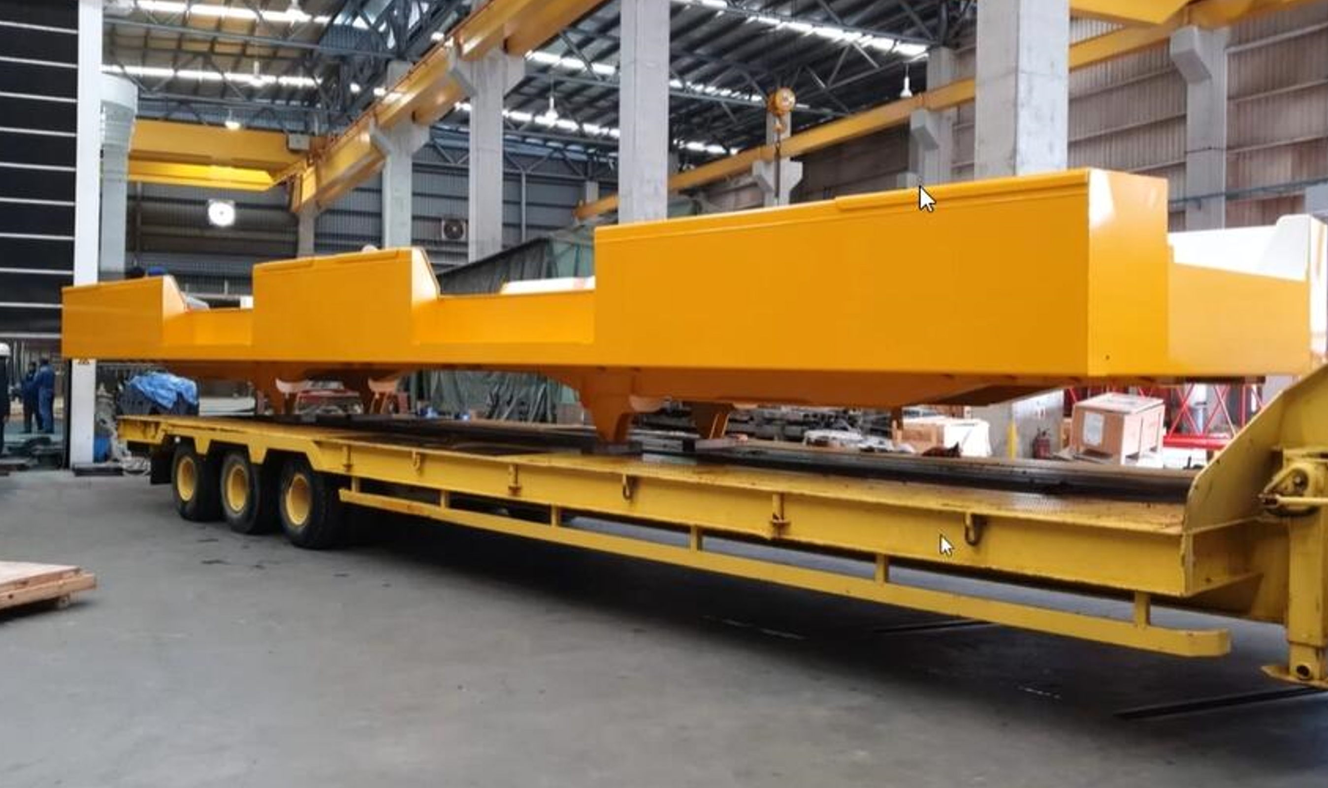 Painted AGV steel chassis fabricated from high-strength Q690 steel with NM400 wear-resistant plate