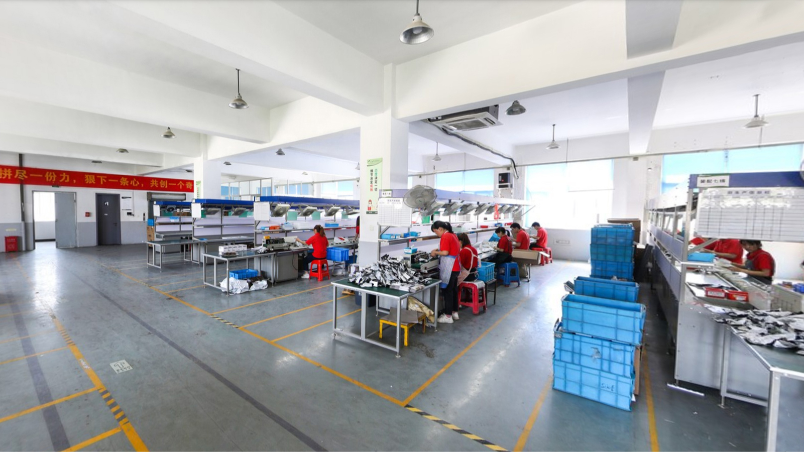 Wall socket production workshop used for moulding, assembly and testing of surface-mounted Schuko sockets