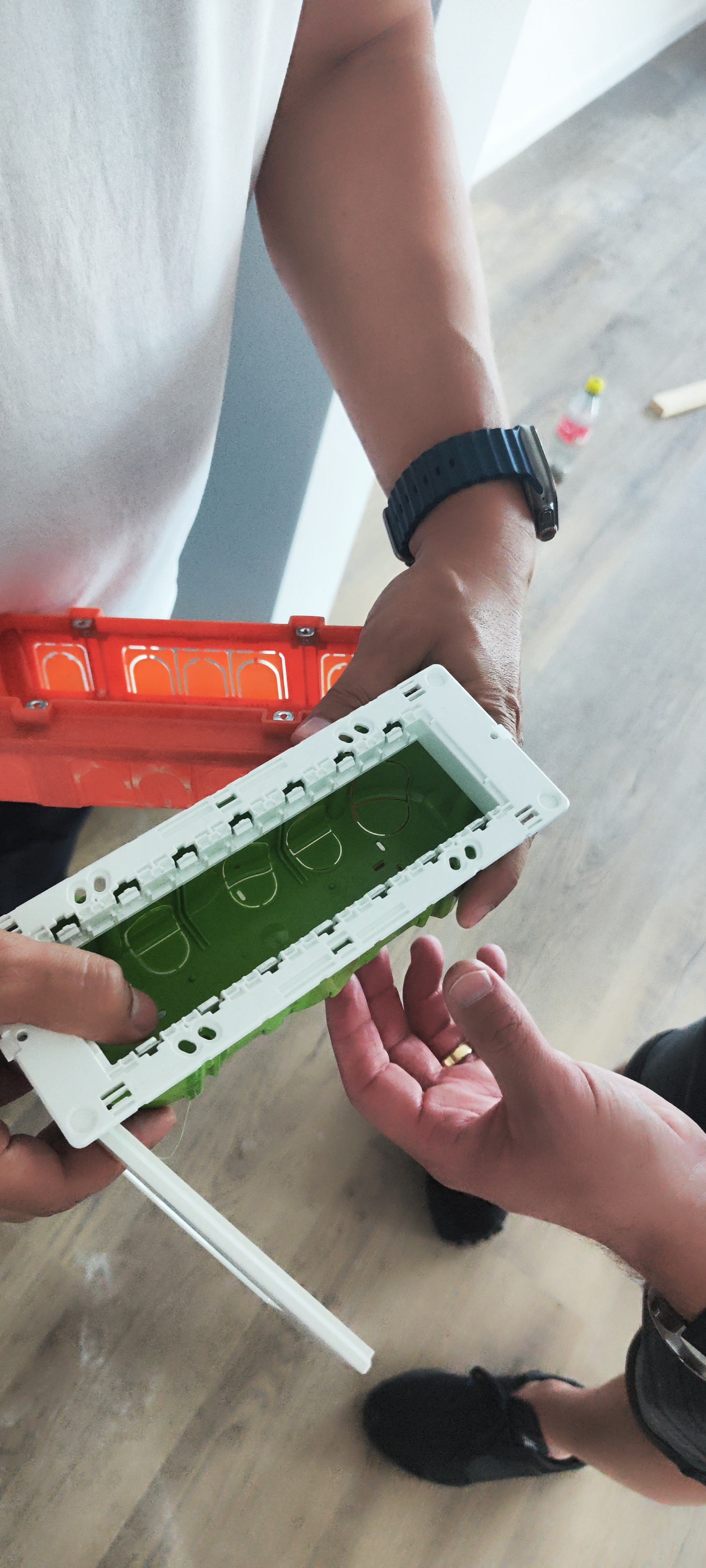 Support frame used to align a modular wall switch plate on an existing retrofit wall box