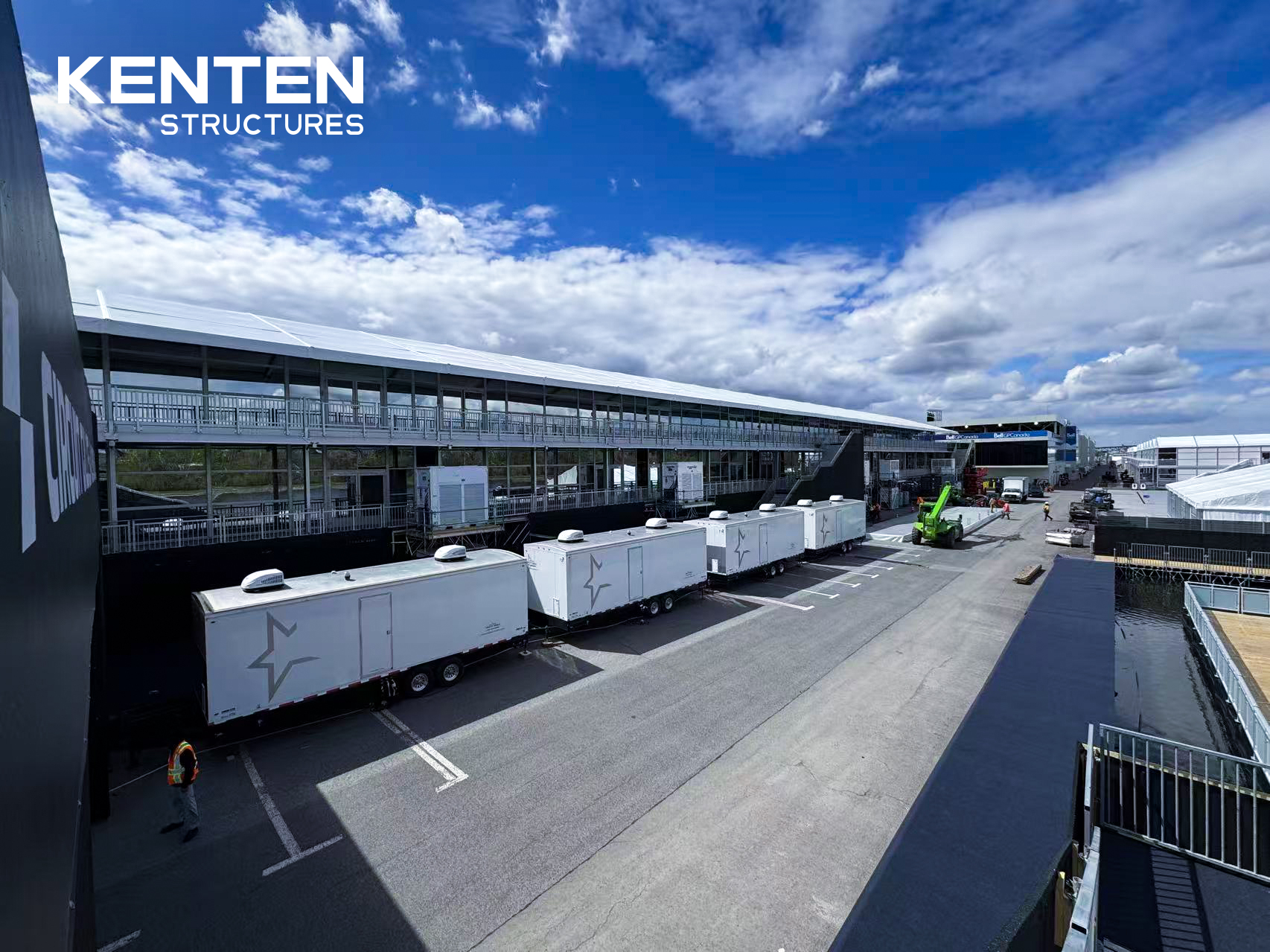 Modular aluminum structure tents forming VIP lounges and hospitality suites at a Formula 1 event