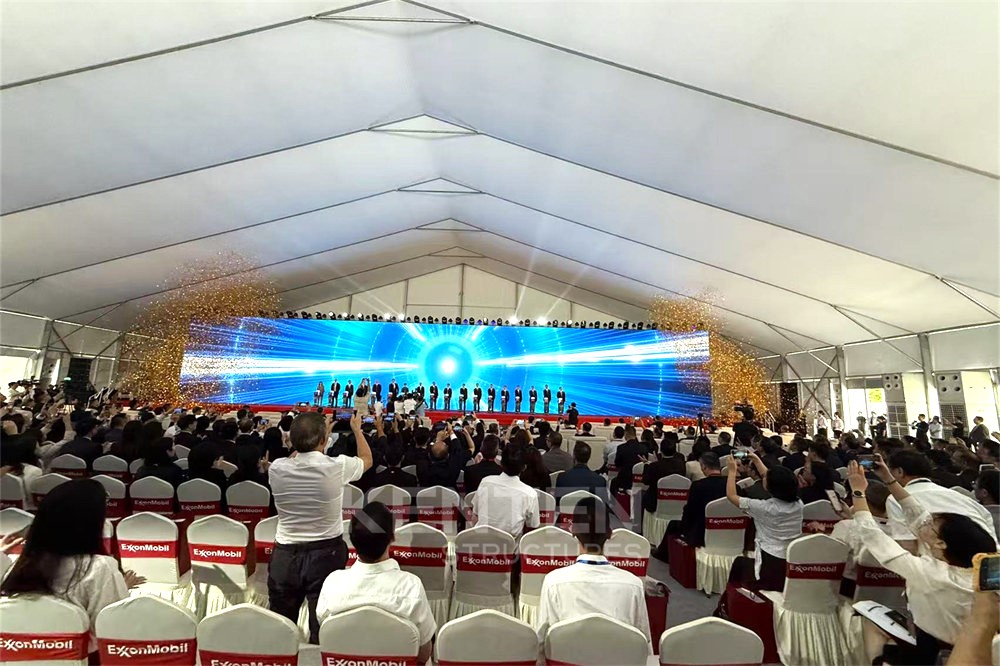 Exhibition tent with clear branding and glass walls