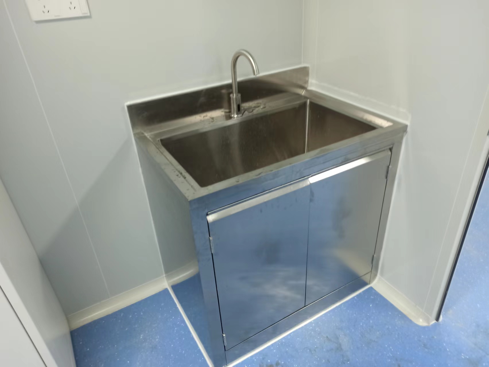 Stainless steel laboratory sink bay detail from a delivered laboratory furniture project