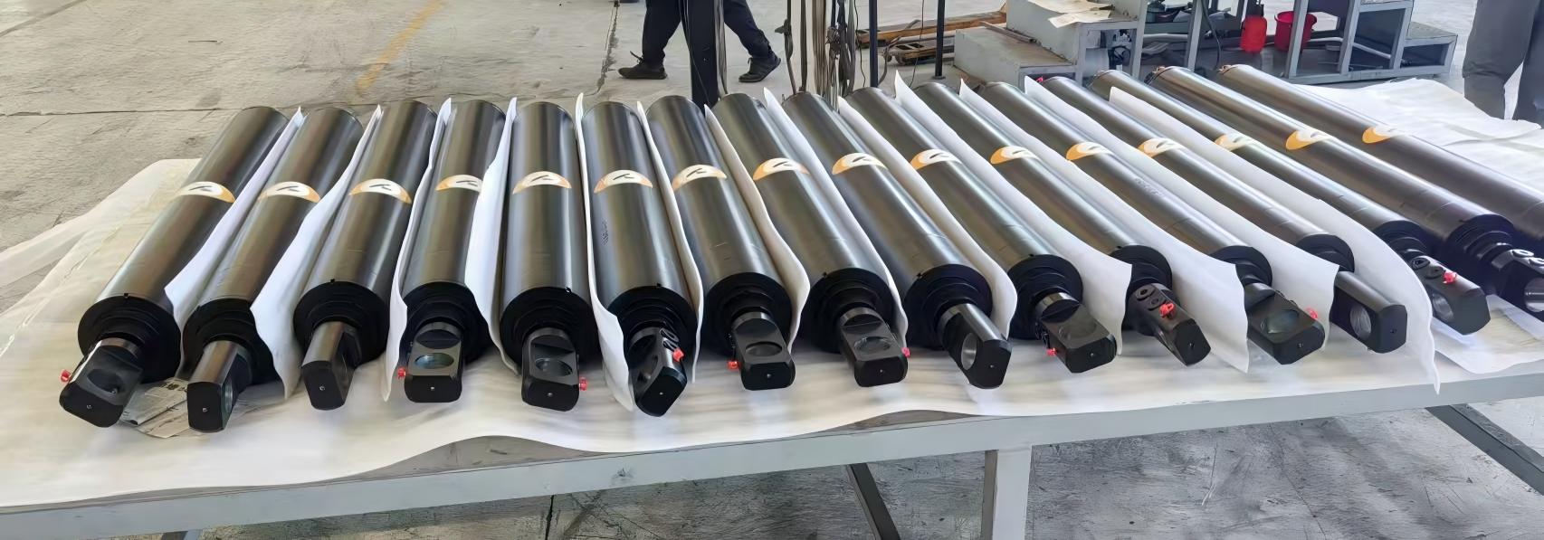Double-acting multi-stage cylinder used in garbage truck applications