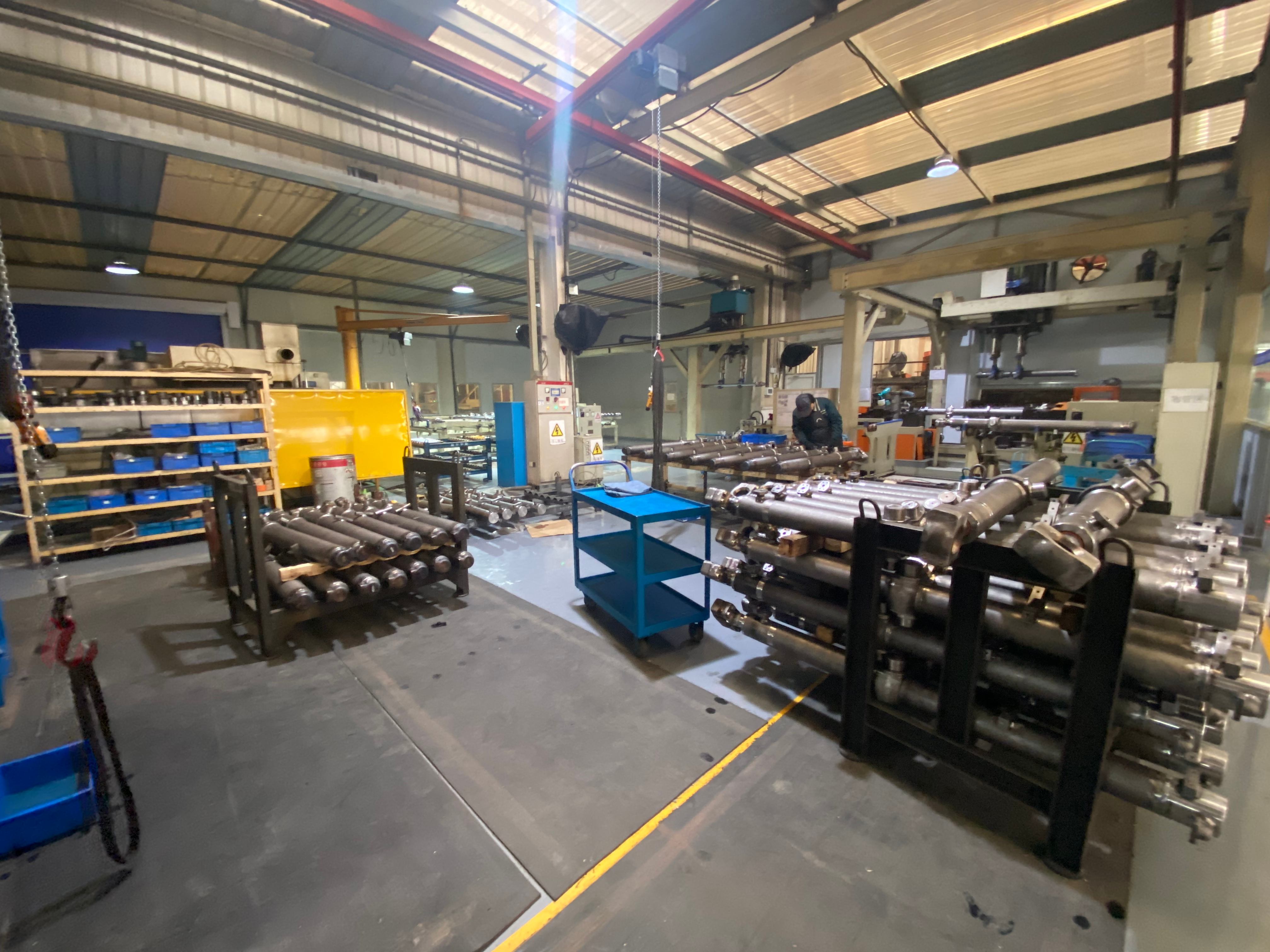 Hydraulic cylinder component assembly line at Apex Hydraulic