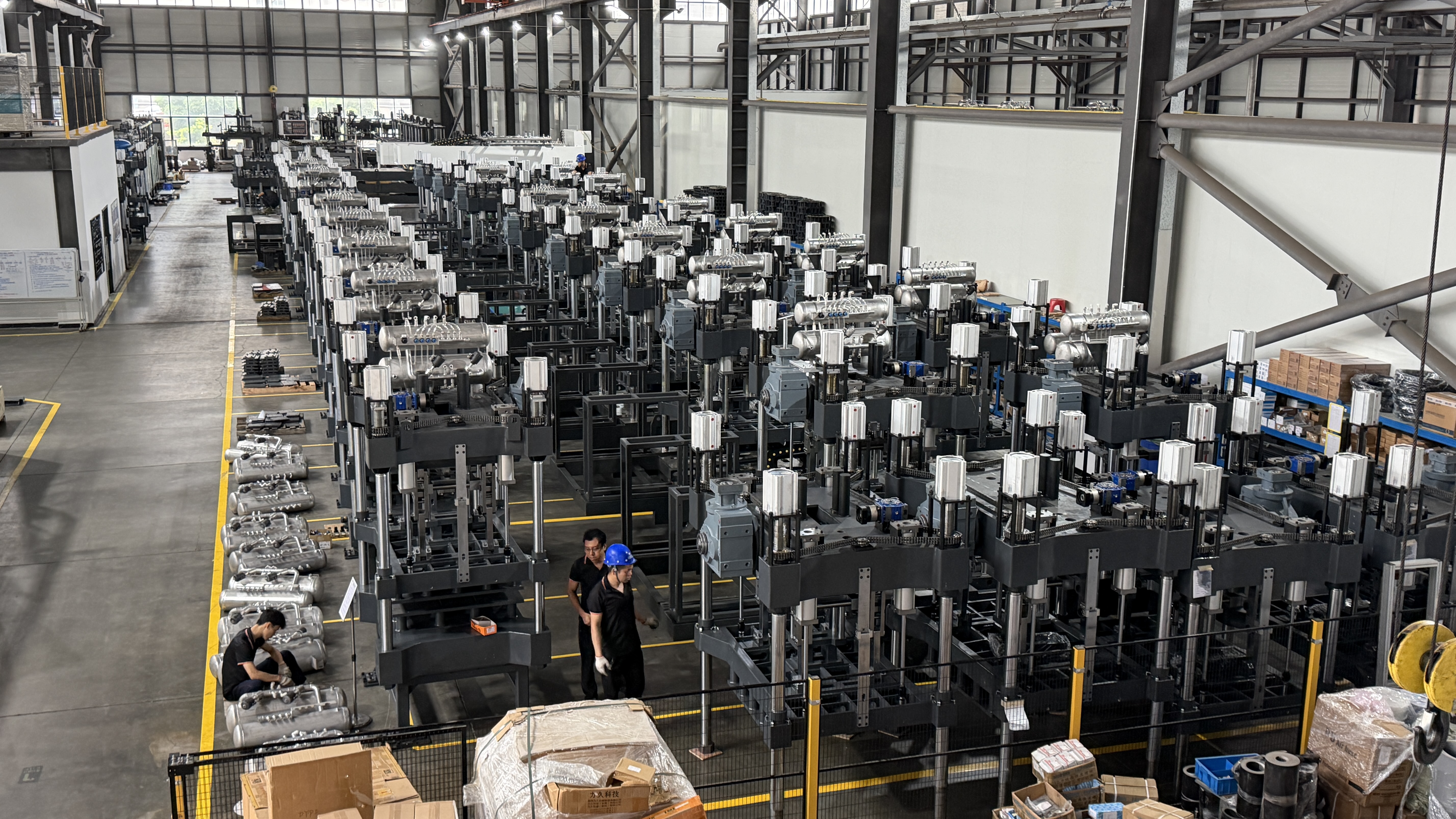 Hanson Pulp Molding equipment assembly workshop showing industrial pulp molding machine manufacturing