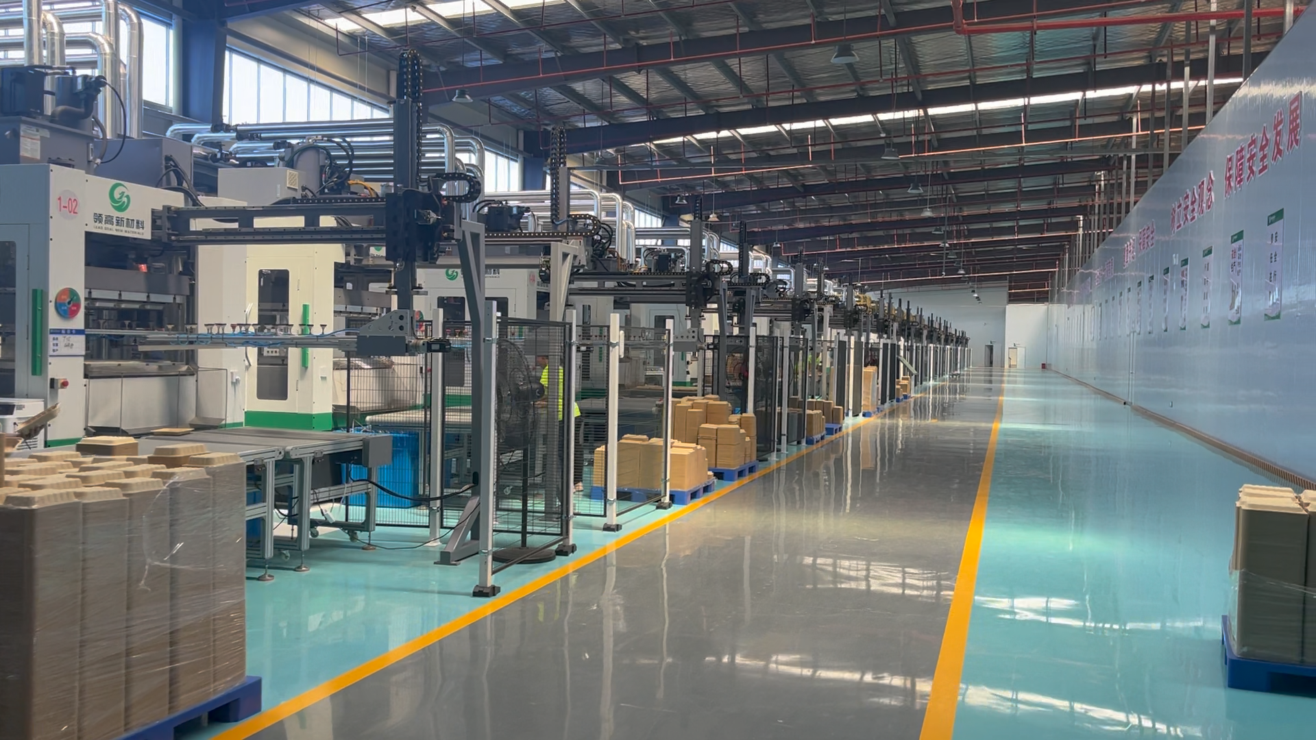 Molded fiber tableware production line in a customer workshop Molded fiber tableware production line installed in a pulp molding customer workshop