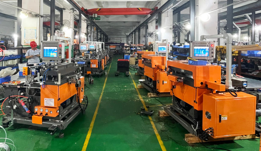 Bag making machine assembly and inspection area at a Foshan flexible packaging equipment factory