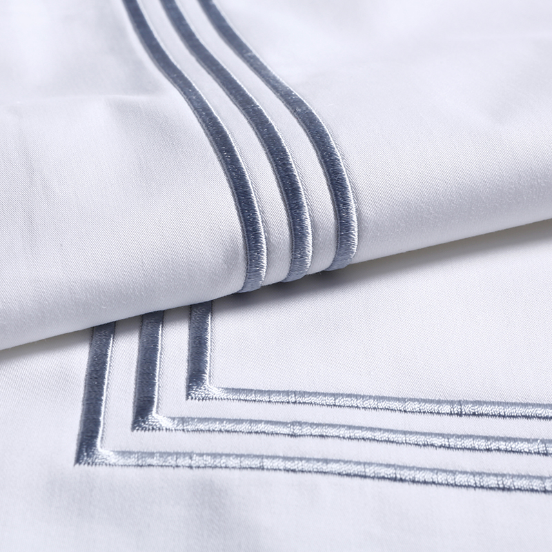 Embroidered bedding set model CP152 with custom hotel logo, made of 100% cotton
